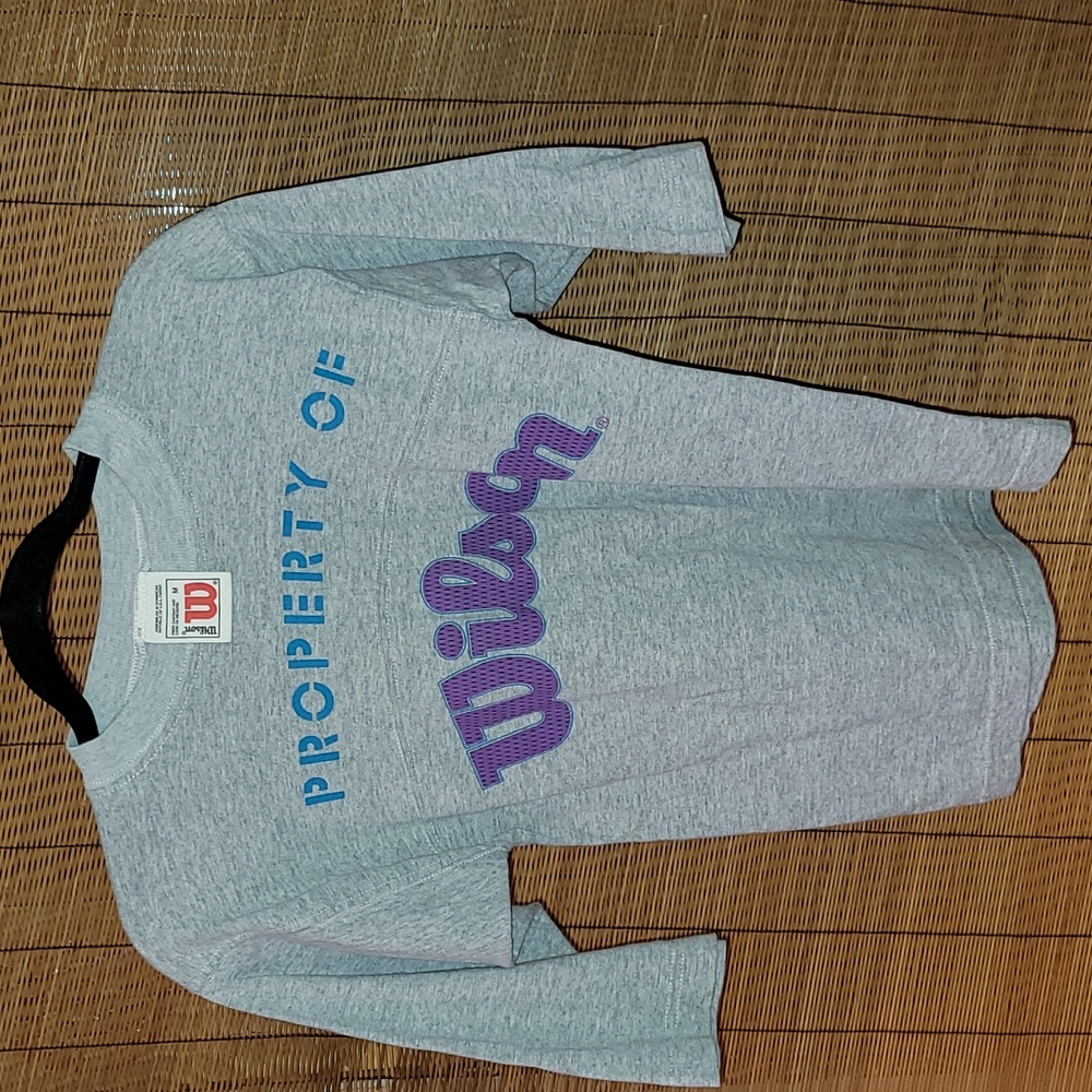 Vintage. 90s. Property of Wilson. Women's size Medium.  Made of USA fabric.
